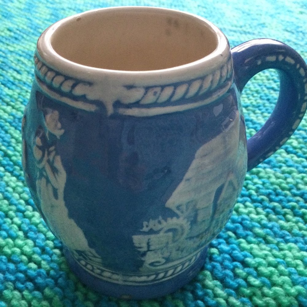 Vintage handmade glazed coffee tea mug blue with white figural signed AK 1975
